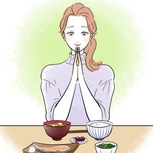 食事をする女性